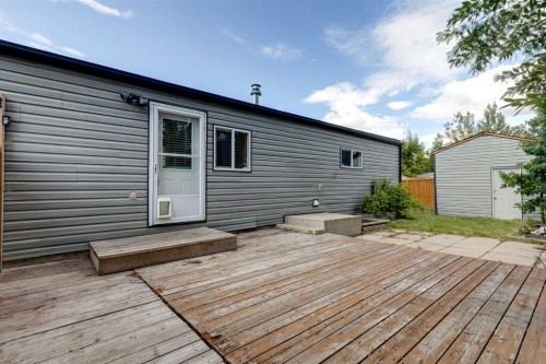 197 Spring Dale Circle Se, Airdrie, AB - Outdoor With Deck Patio Veranda With Exterior