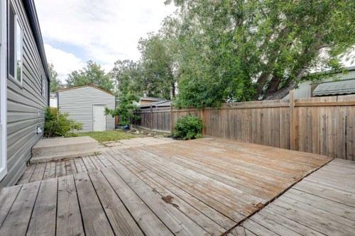 197 Spring Dale Circle Se, Airdrie, AB - Outdoor With Deck Patio Veranda With Exterior
