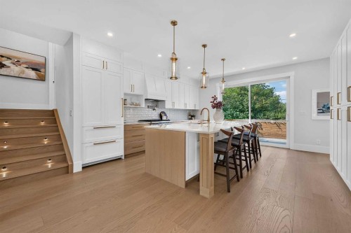 88 Woodlark Drive Sw, Calgary, AB - Indoor Photo Showing Kitchen With Upgraded Kitchen