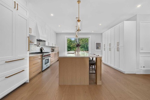 88 Woodlark Drive Sw, Calgary, AB - Indoor Photo Showing Kitchen With Upgraded Kitchen