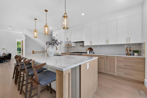 88 Woodlark Drive Sw, Calgary, AB - Indoor Photo Showing Kitchen With Upgraded Kitchen