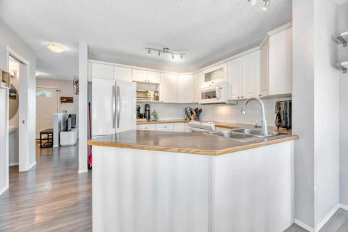 58 Rocky Ridge Green, Calgary, AB 