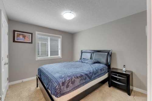 130 Brightonwoods Grove Se, Calgary, AB - Indoor Photo Showing Bedroom