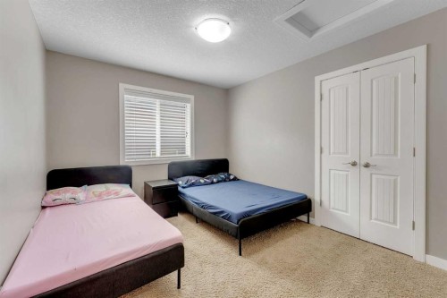 130 Brightonwoods Grove Se, Calgary, AB - Indoor Photo Showing Bedroom