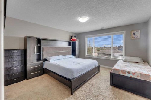 130 Brightonwoods Grove Se, Calgary, AB - Indoor Photo Showing Bedroom