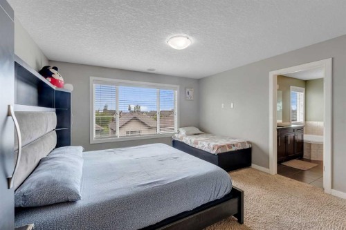 130 Brightonwoods Grove Se, Calgary, AB - Indoor Photo Showing Bedroom