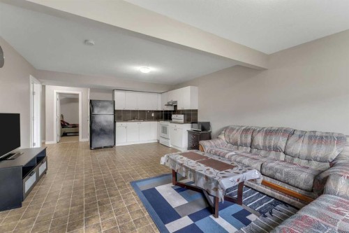 130 Brightonwoods Grove Se, Calgary, AB - Indoor Photo Showing Living Room
