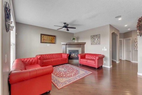 130 Brightonwoods Grove Se, Calgary, AB - Indoor Photo Showing Living Room With Fireplace