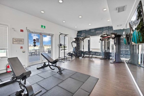 2101-76 Cornerstone Passage Ne, Calgary, AB - Indoor Photo Showing Gym Room