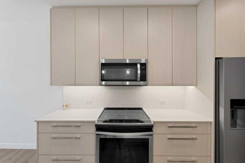 2101-76 Cornerstone Passage Ne, Calgary, AB - Indoor Photo Showing Kitchen