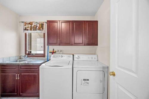 10385 Hamptons Boulevard Nw, Calgary, AB - Indoor Photo Showing Laundry Room