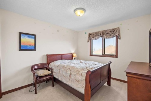 10385 Hamptons Boulevard Nw, Calgary, AB - Indoor Photo Showing Bedroom
