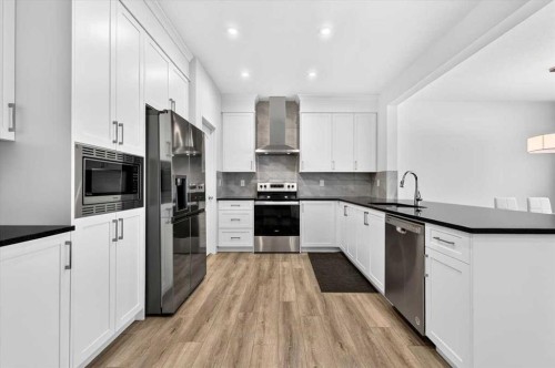 96 Rowmont Heath Nw, Calgary, AB 
