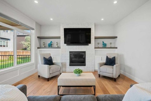 244 Sandpiper Boulevard, Chestermere, AB - Indoor Photo Showing Living Room With Fireplace