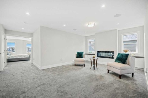 244 Sandpiper Boulevard, Chestermere, AB - Indoor Photo Showing Living Room With Fireplace