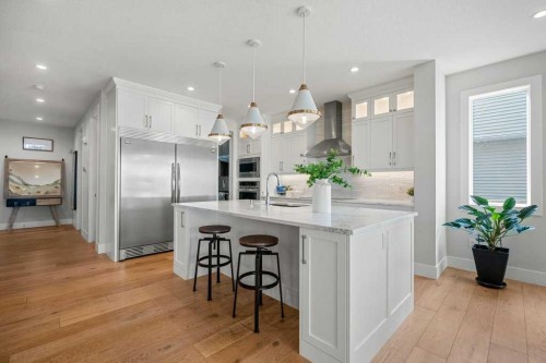 244 Sandpiper Boulevard, Chestermere, AB - Indoor Photo Showing Kitchen With Upgraded Kitchen