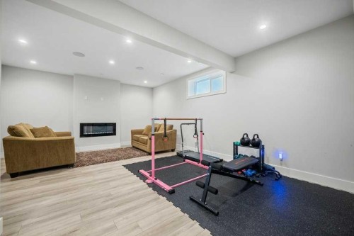244 Sandpiper Boulevard, Chestermere, AB - Indoor Photo Showing Gym Room