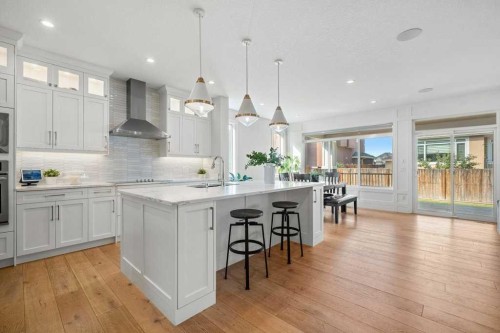 244 Sandpiper Boulevard, Chestermere, AB - Indoor Photo Showing Kitchen With Upgraded Kitchen