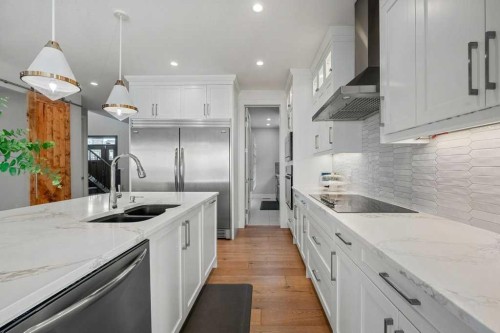 244 Sandpiper Boulevard, Chestermere, AB - Indoor Photo Showing Kitchen With Double Sink With Upgraded Kitchen