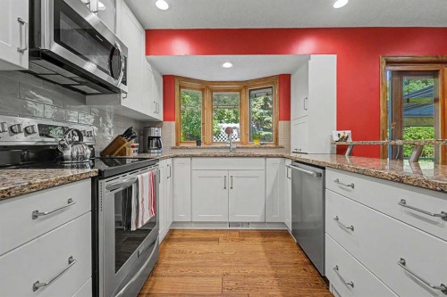 75 Deerbrook Road Se, Calgary, AB - Indoor Photo Showing Kitchen
