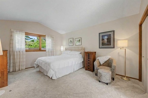 75 Deerbrook Road Se, Calgary, AB - Indoor Photo Showing Bedroom