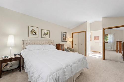 75 Deerbrook Road Se, Calgary, AB - Indoor Photo Showing Bedroom