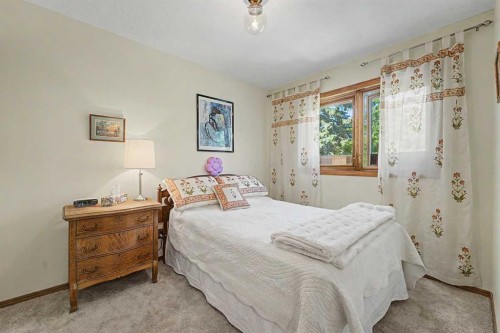 75 Deerbrook Road Se, Calgary, AB - Indoor Photo Showing Bedroom