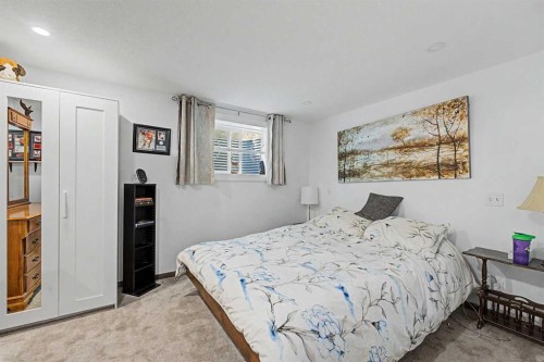 75 Deerbrook Road Se, Calgary, AB - Indoor Photo Showing Bedroom