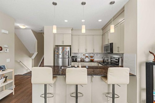 130 Silverado Plains Park Sw, Calgary, AB - Indoor Photo Showing Kitchen With Upgraded Kitchen