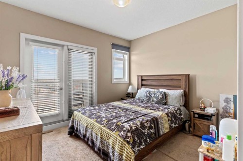 130 Silverado Plains Park Sw, Calgary, AB - Indoor Photo Showing Bedroom