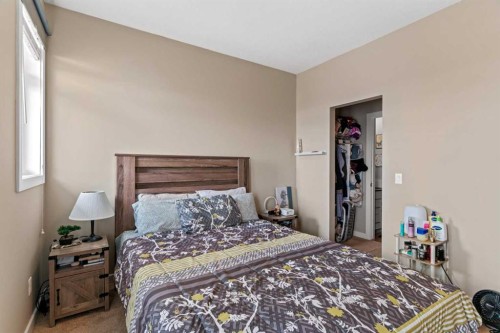 130 Silverado Plains Park Sw, Calgary, AB - Indoor Photo Showing Bedroom