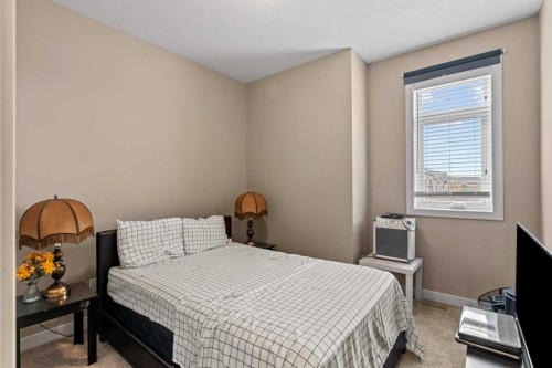 130 Silverado Plains Park Sw, Calgary, AB - Indoor Photo Showing Bedroom