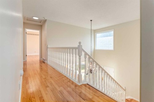 116 Pump Hill Bay Sw, Calgary, AB 