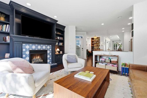 2025 45 Avenue Sw, Calgary, AB - Indoor Photo Showing Living Room With Fireplace