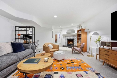 2025 45 Avenue Sw, Calgary, AB - Indoor Photo Showing Living Room With Fireplace