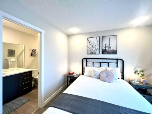148 Carrington Boulevard Nw, Calgary, AB - Indoor Photo Showing Bedroom