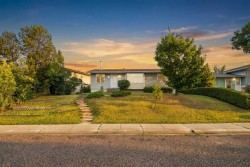 248 Huntcroft Road NE Calgary, AB T2K 4E2