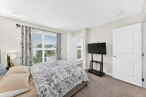 112 Carrington Boulevard Nw, Calgary, AB - Indoor Photo Showing Bedroom