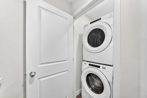 112 Carrington Boulevard Nw, Calgary, AB - Indoor Photo Showing Laundry Room