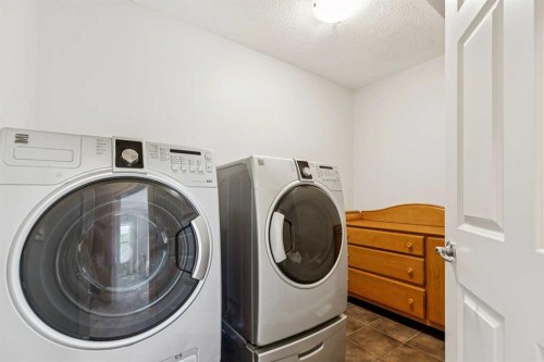 115 Couture Crescent Sw, Calgary, AB 
