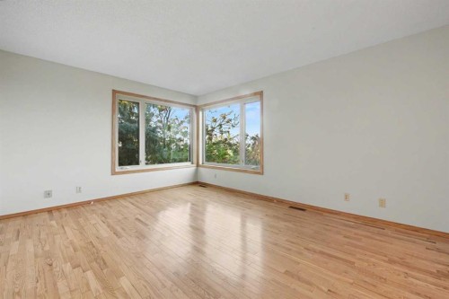 71 Coach Gate Way Sw, Calgary, AB 