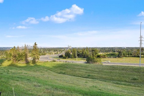 71 Coach Gate Way Sw, Calgary, AB 