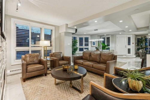 8203-400 Eau Claire Avenue Sw, Calgary, AB - Indoor Photo Showing Living Room