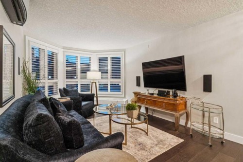 8203-400 Eau Claire Avenue Sw, Calgary, AB - Indoor Photo Showing Living Room