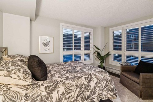 8203-400 Eau Claire Avenue Sw, Calgary, AB - Indoor Photo Showing Bedroom