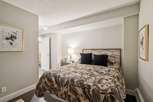 8203-400 Eau Claire Avenue Sw, Calgary, AB - Indoor Photo Showing Bedroom