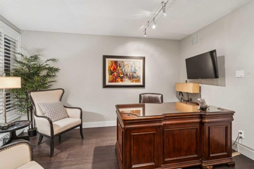 8203-400 Eau Claire Avenue Sw, Calgary, AB - Indoor With Storage