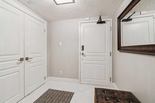 8203-400 Eau Claire Avenue Sw, Calgary, AB - Indoor Photo Showing Bedroom