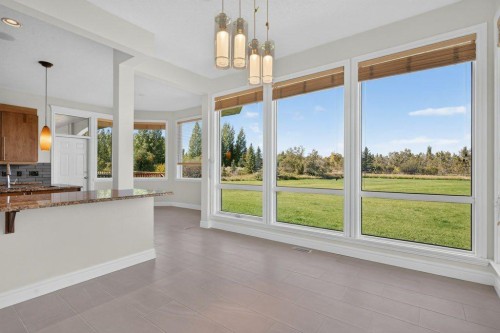 4 Norris Coulee Loop, De Winton, AB 