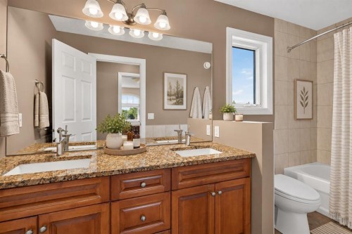 4 Norris Coulee Loop, De Winton, AB 